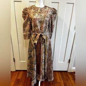 Long dress with asymmetrical bottom